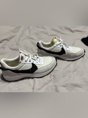 Nike White Sneakers with Black Glitter Swoosh and Cream Accents